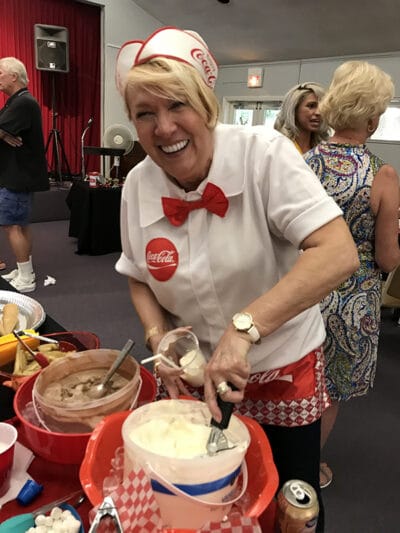 Sharon Scooping Ice Create At Neighborhood Party